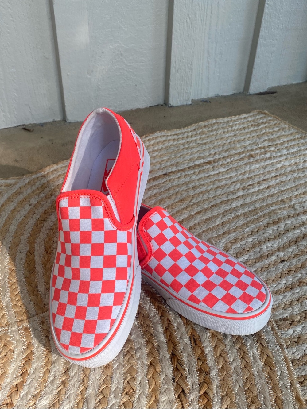 Vans Classic Checkerboard Slip-On Shoes in Bright Salmon/Pink